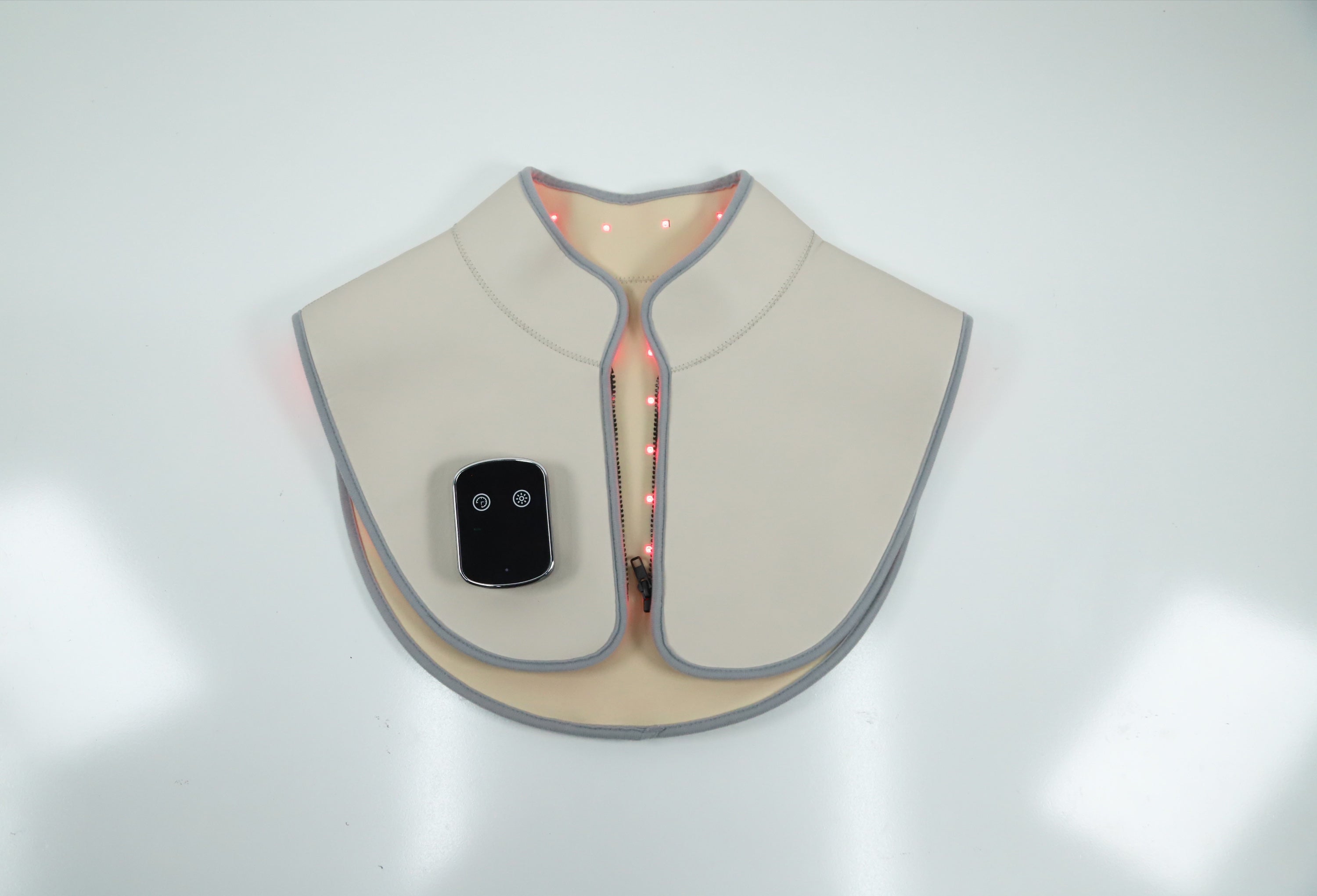 Neck and shoulder wrap with detachable controller, front view